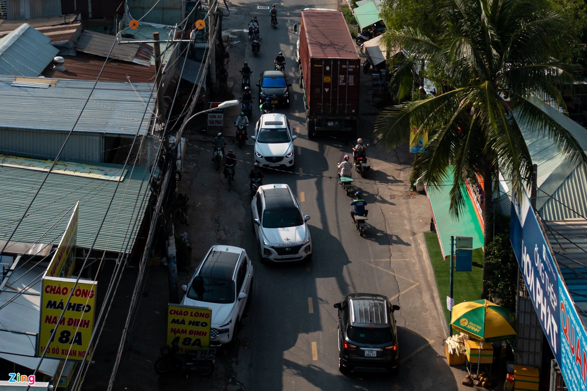 TP HCM: Doan duong hon 2 km sua 4 nam chua xong-Hinh-9