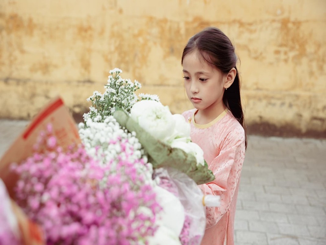 Dan nhoc ti nha sao Viet dang yeu khi dien ao dai don Tet-Hinh-14