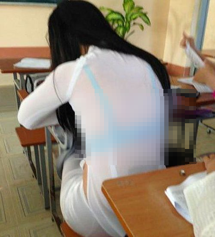 Dien ao dai trang voi tat luoi, nu sinh gay nhuc mat-Hinh-8