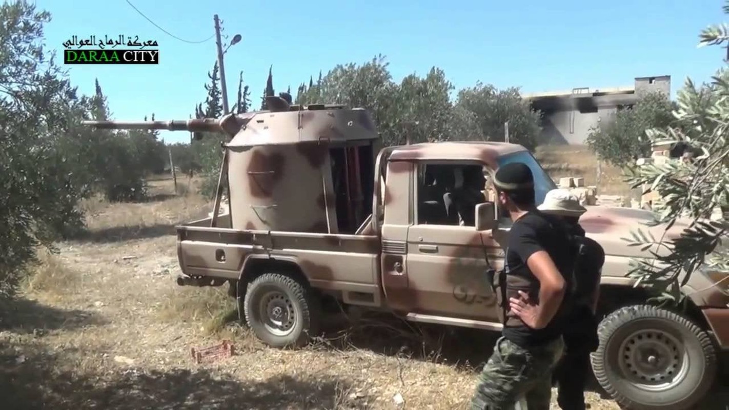 Chien truong Syria: Gan thap phao BMP-1 gan tren thung xe ban tai-Hinh-4