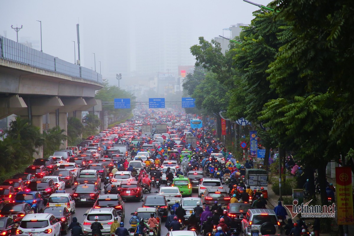 Ha Noi chim trong mua phun, suong giang tu sang den trua-Hinh-4