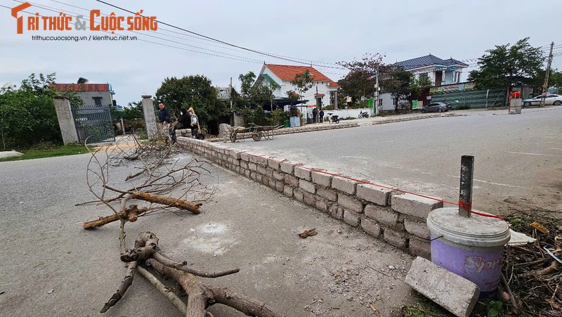 Hai Duong: Vi sao nguoi dan xay tuong gach chan long duong?-Hinh-3